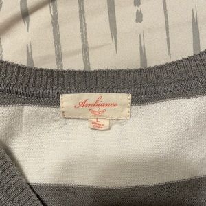 Grey and White long sleeve sweater, says Large but runs small